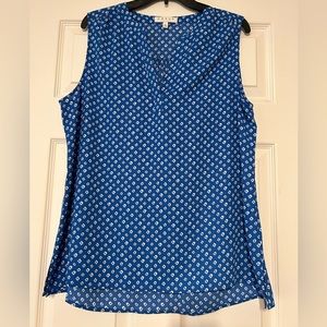 Blue sleeveless top with v-neck. Size L